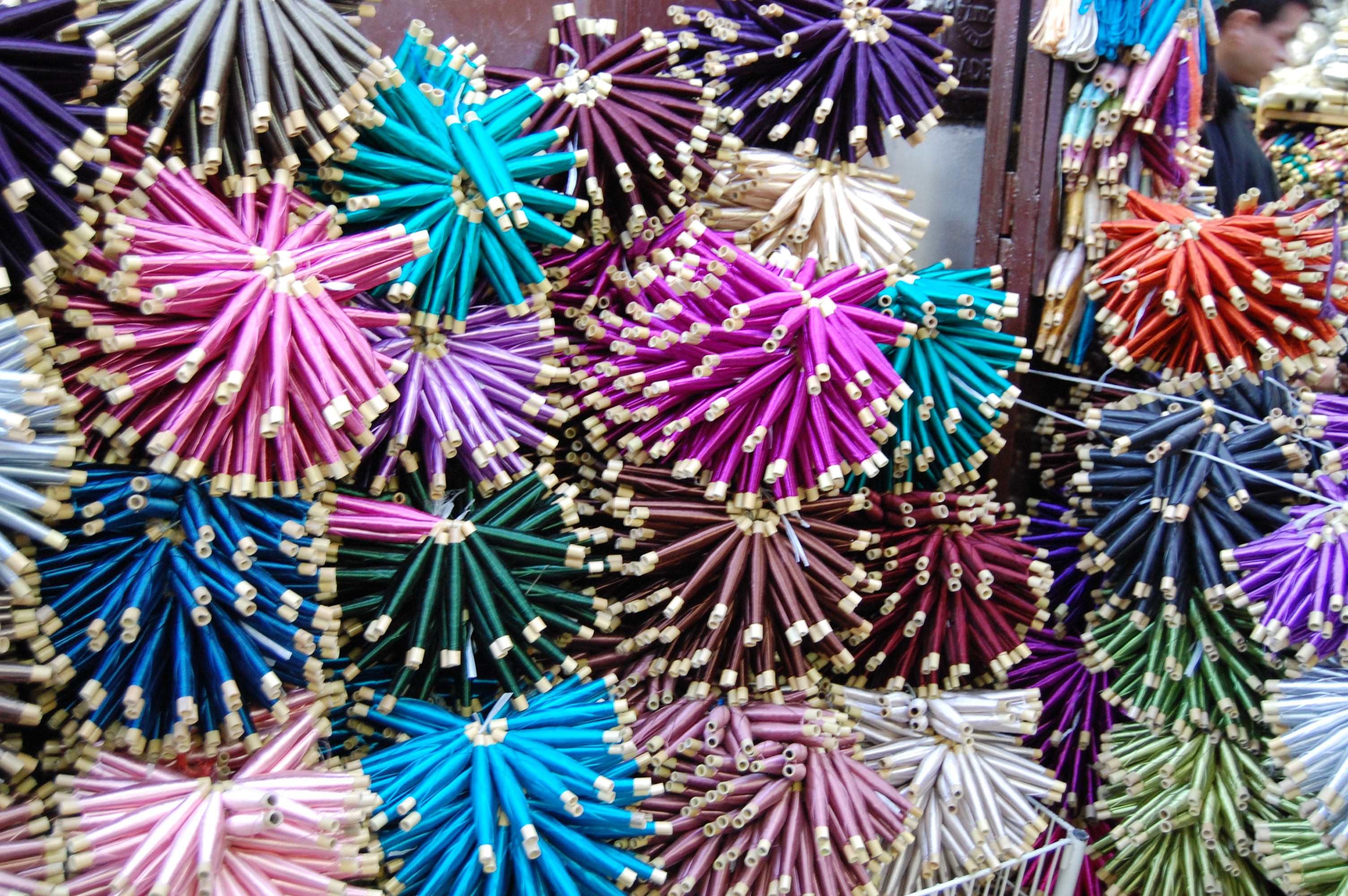 Coloured silks, Fez Souk, Morocco
