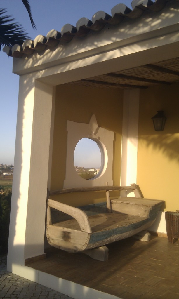 Cool wooden chair boat thing at a gold club in Luz.