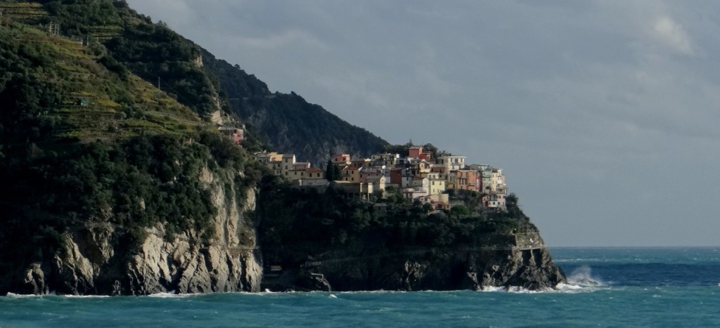 Manarola in the sun taken from Corniglia