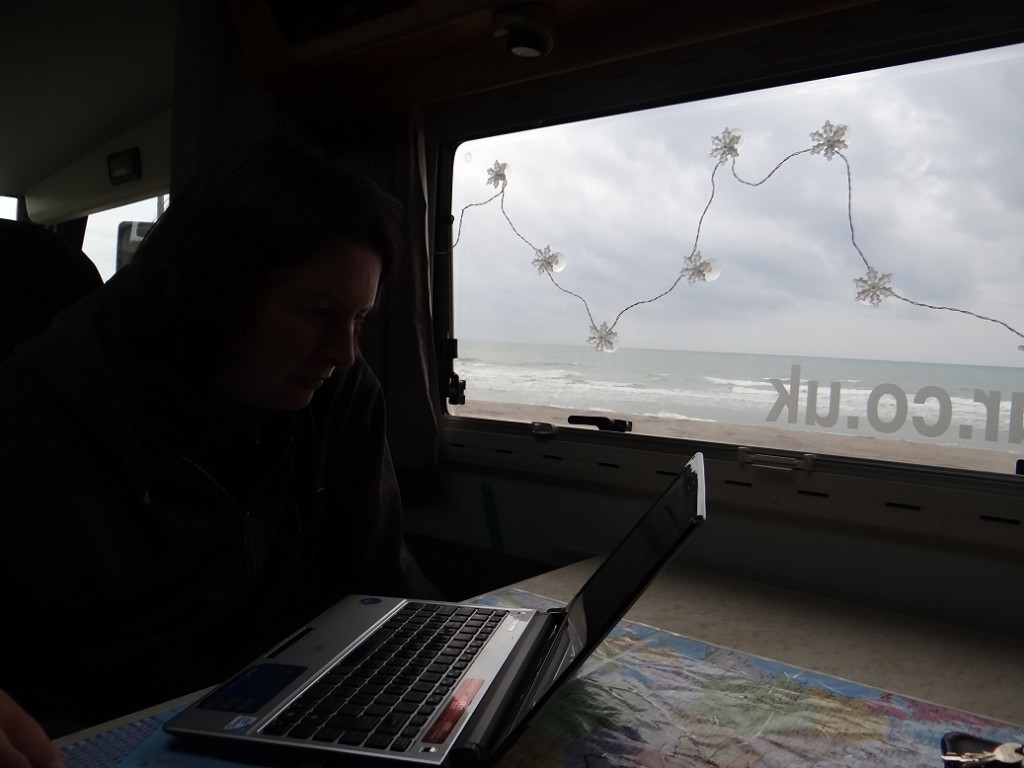 Ju works on the almost-nearly-last-final edits of our next book. What an office!