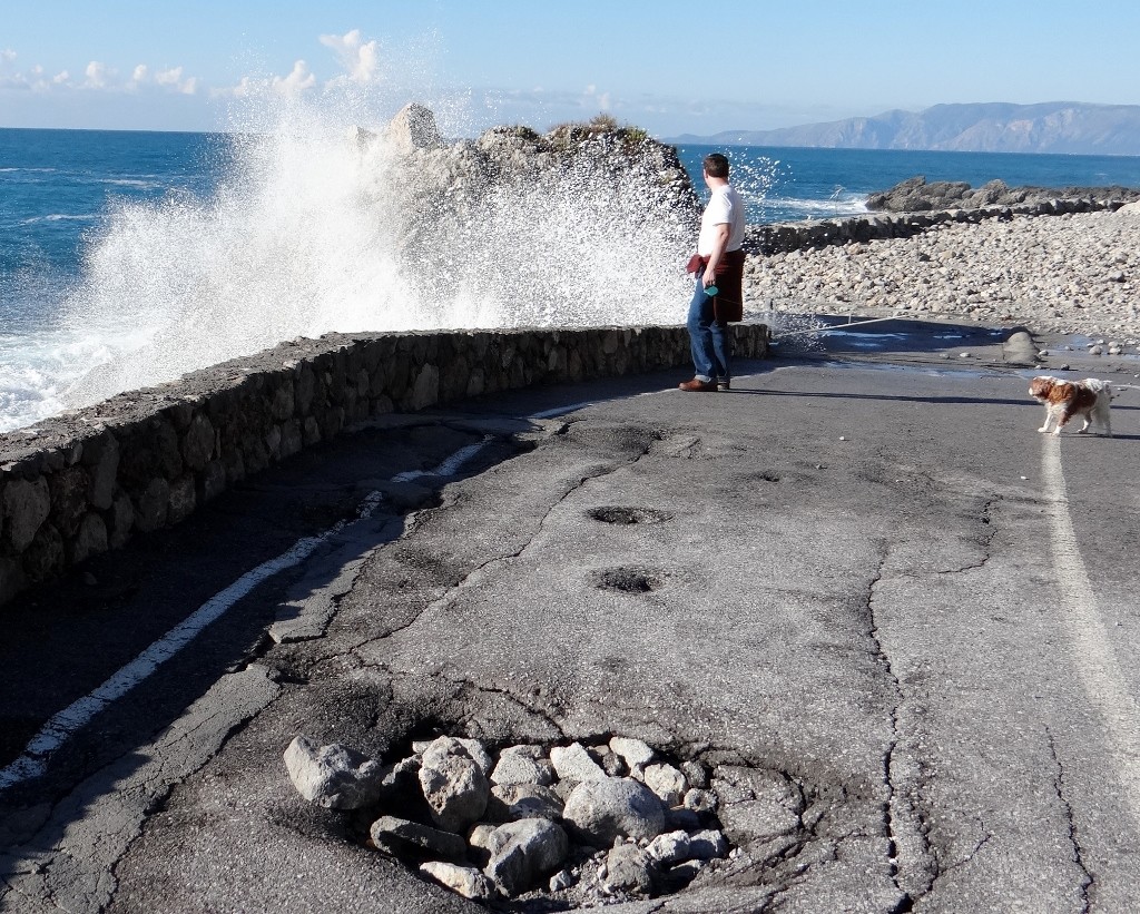It may be sunny, but the sea is still angry - as Charlie keeps a safe distance