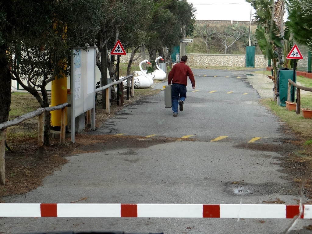 Jay crosses the barrier to empty the loo - naughty!