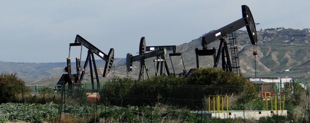 Derricks bringing up their black gold