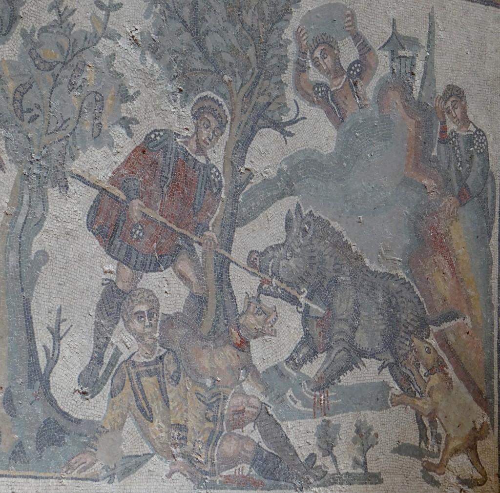 The poor wild boar is about to get it, either by lance, the dogs or a rock on his head!