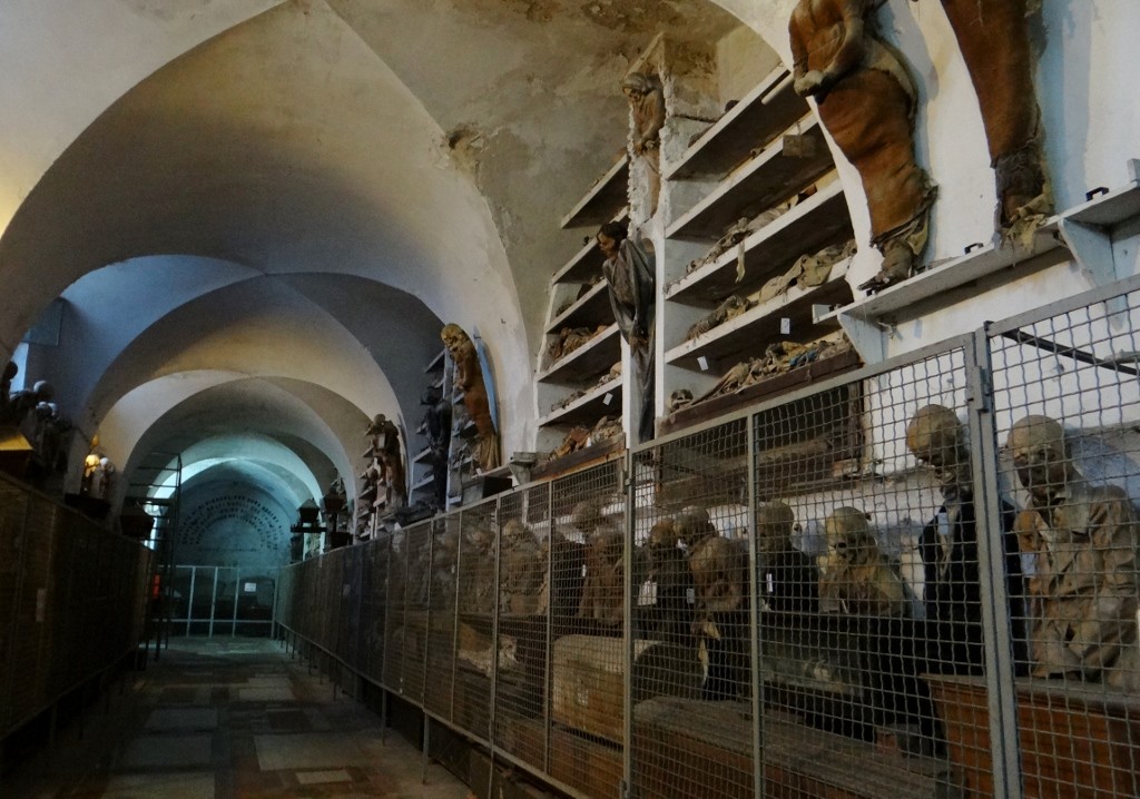 Catacombe Cappuccini the walls are lined with hanging up and lying down bodies