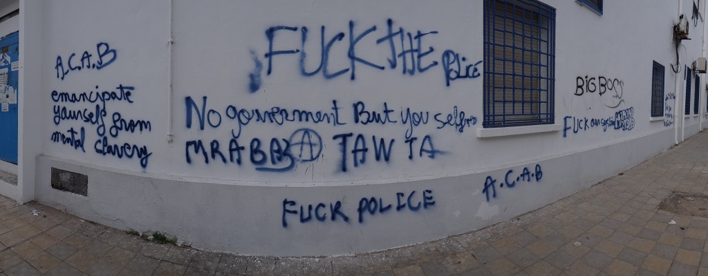 They say graffiti is a great way to judge to political temperature of a country. We've usually no idea what it means. This stuff in Bizerte takes no interpretation!