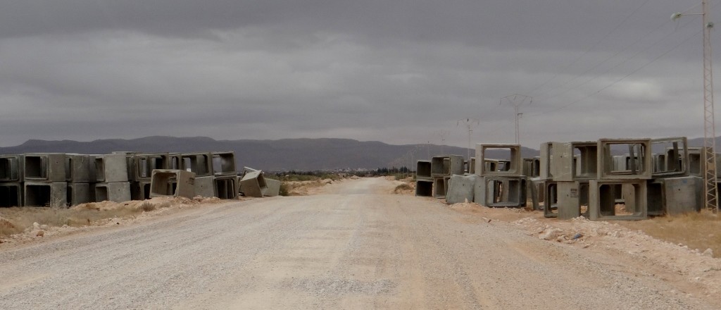 And it's no wonder because some kind soul has taken all the tarmac again! Another 30km of filling loosening bumpiness, with random concrete blocks to look at