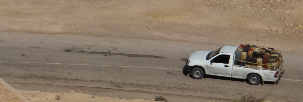 The cans in the back of that truck are full of petrol from Libya where it is so much cheaper - this is a delivery for one of the DIY petrol stations