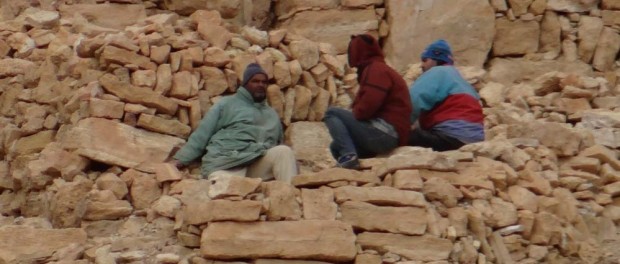 What you don't want to see as you're climbing a stony hill in the desert, unless you want a guided tour of said pile of stones, in indecipherable French.