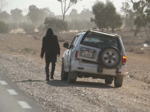 Squished car, still running, sort of.