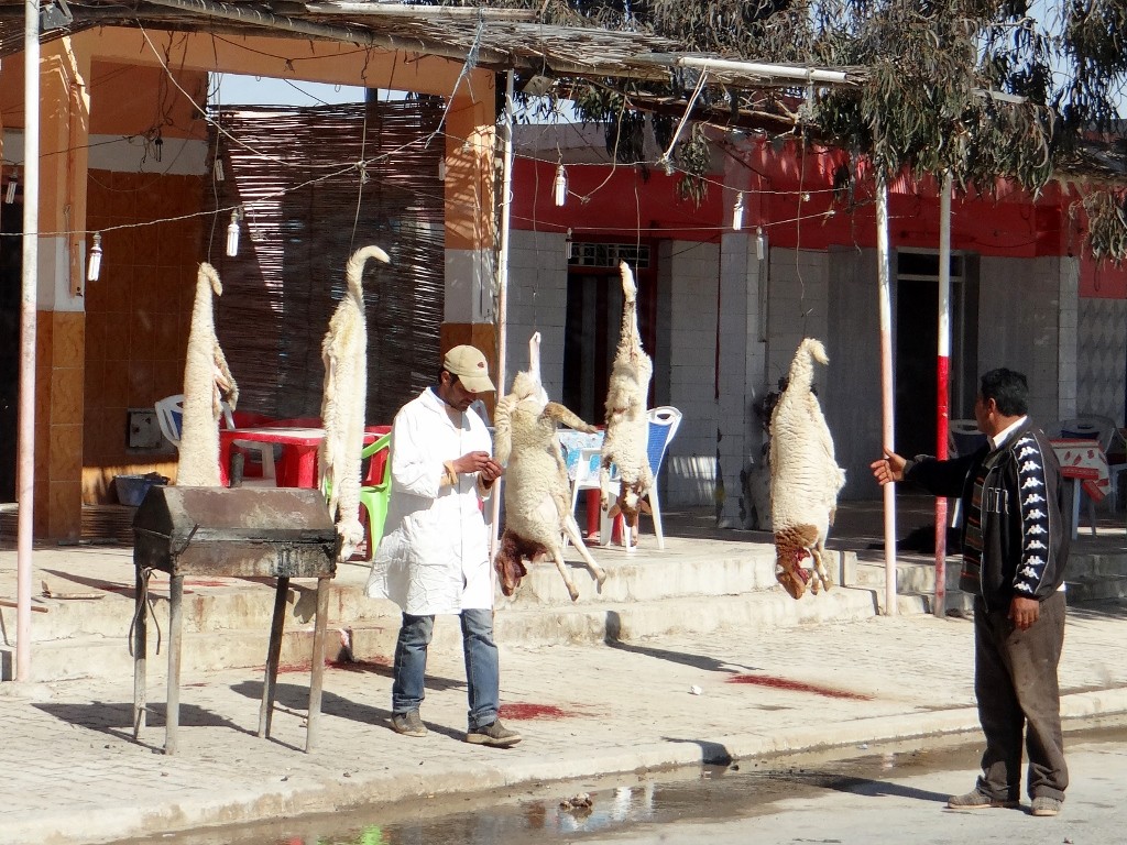 Firing up the BBQ and hanging the meat ready for the Saturday cafe rush