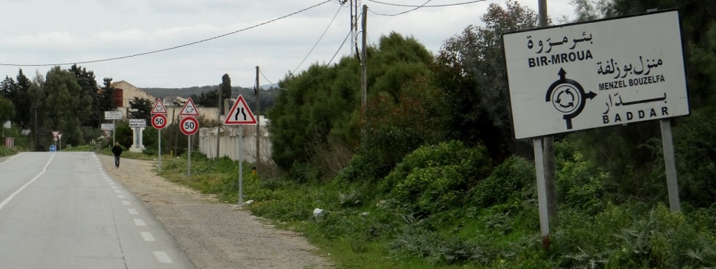Multiple signs to remind you which way to go around the roundabout - and still they get it wrong!