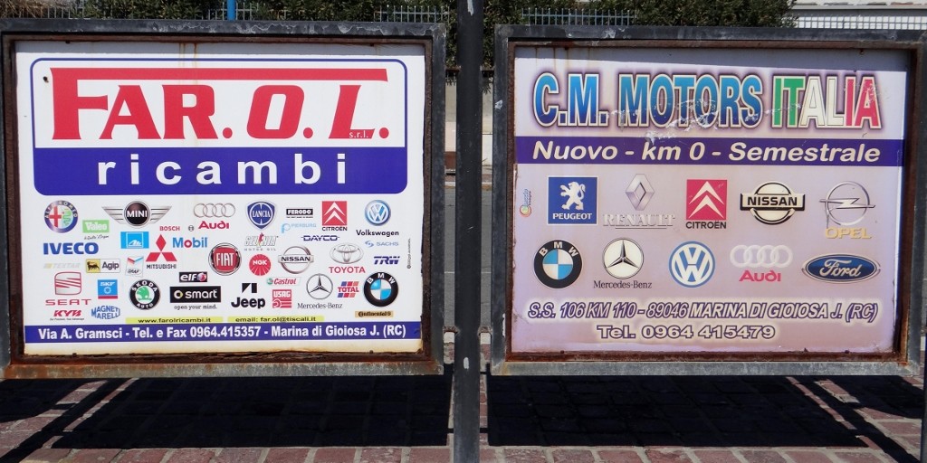 Adverts along the sea front, if there is a make of car the bloke on the left doesn't cover, the one on the right does.