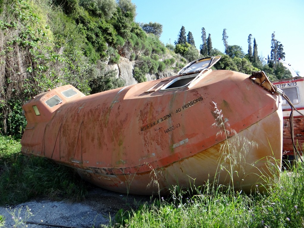 Found among the old boats by the harbour - an old lifeboat, wouldn't want to be in it right now, but sanctuary from a sinking ship