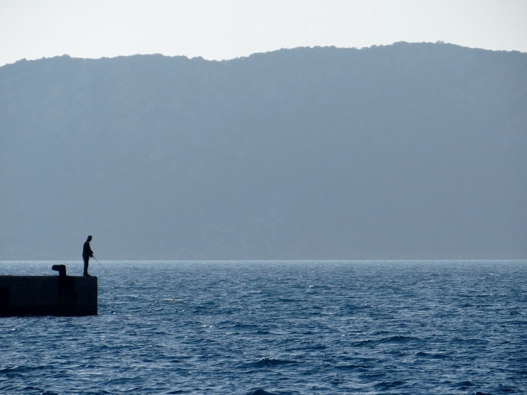 Evening fishing in Naverino bay