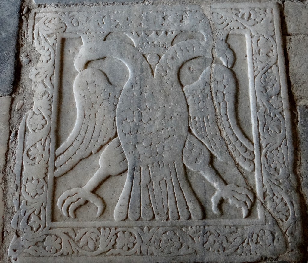 The double headed eagle of Byzantium marks where the last Eastern Emperor was crowned in 1448; five years later he perished along with his empire in the Turkish sacking of Constantinople