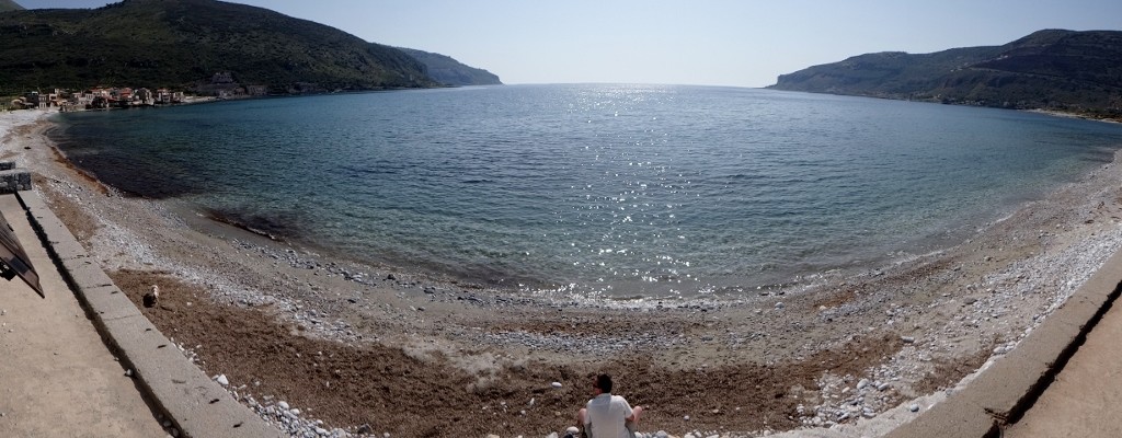 Jay and Charlie play on the beach in front of Dave's parking spot in Neo Itylo