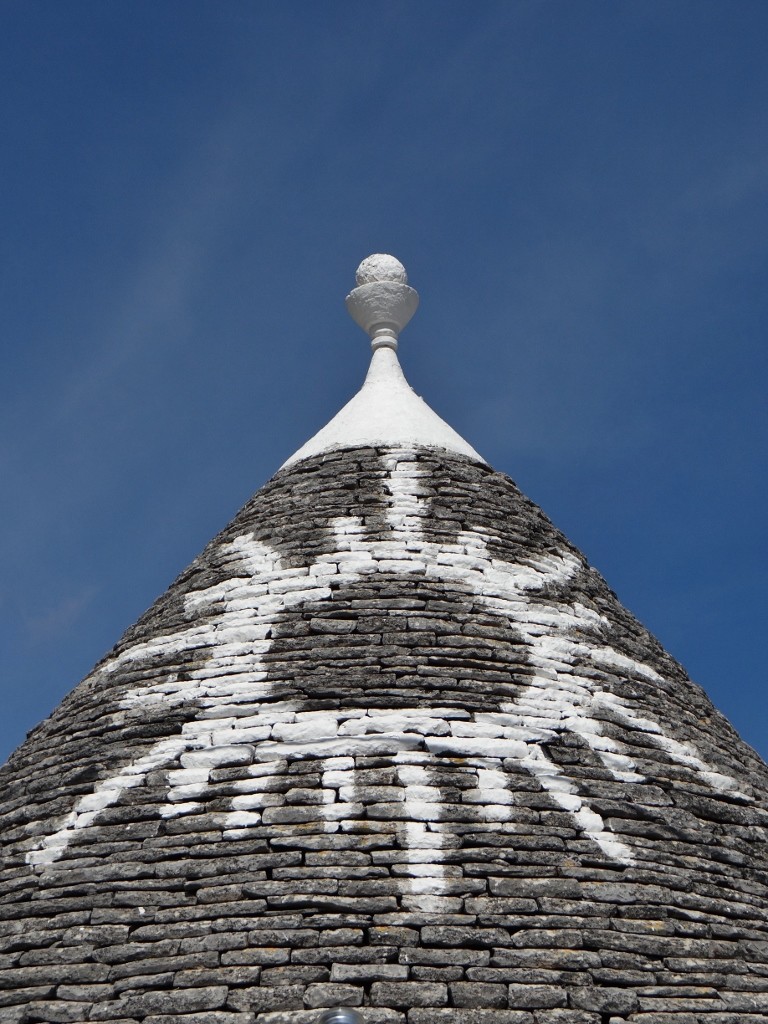 Good luck symbols painted on the roofs - a recent addition from the 1950's!