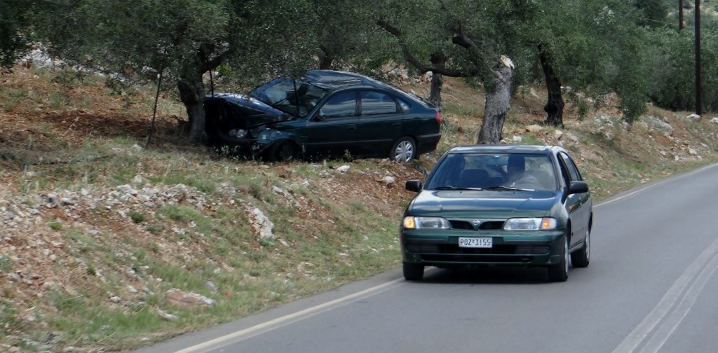 We see loads of little shrines on the roadside, this is our first Greek accident!