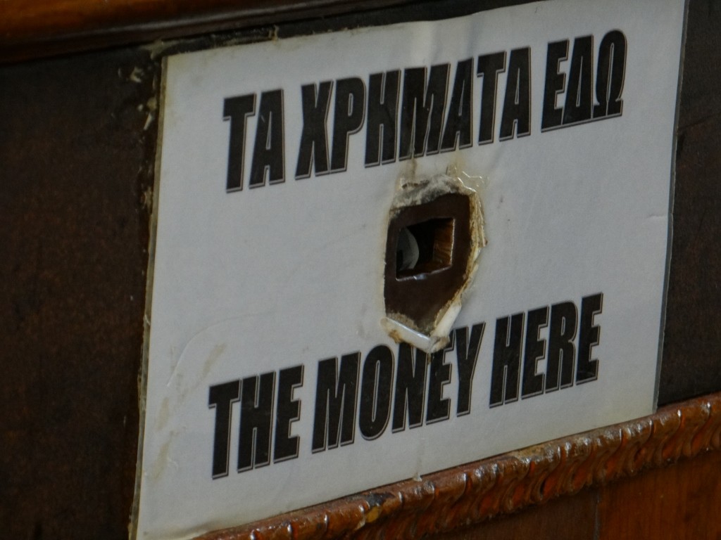 Jay spotted this unsubtle sign in the church with the bullet hole in it!