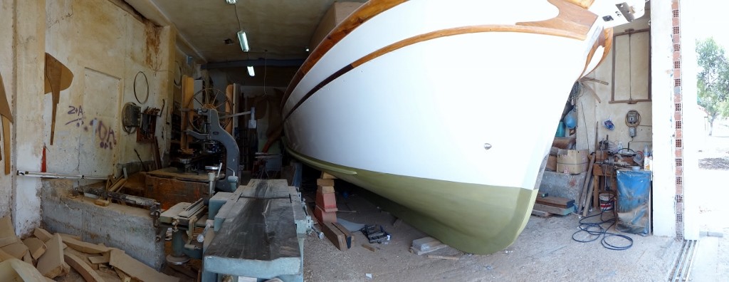 This boat touched the ceiling in the tiny boat yard.