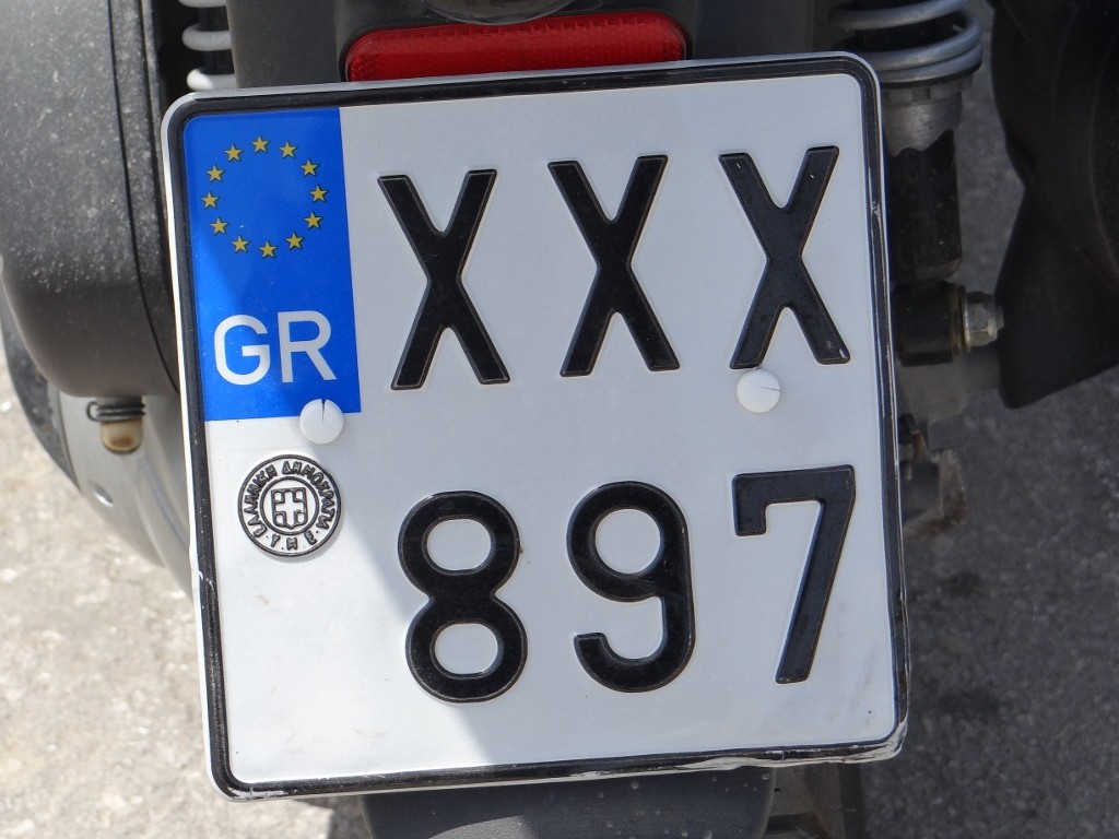 Friendly bikers have kisses on their registrations