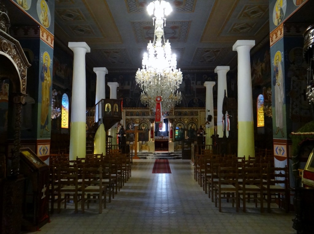 The rebuilt church has the pillars of the old church in it, stopping a couple of feet short of the roof.