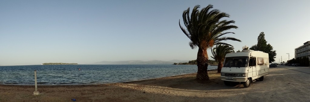 A welcome breeze in the palm trees, the white pole on the left is a water tap that only shoots the water straight up!