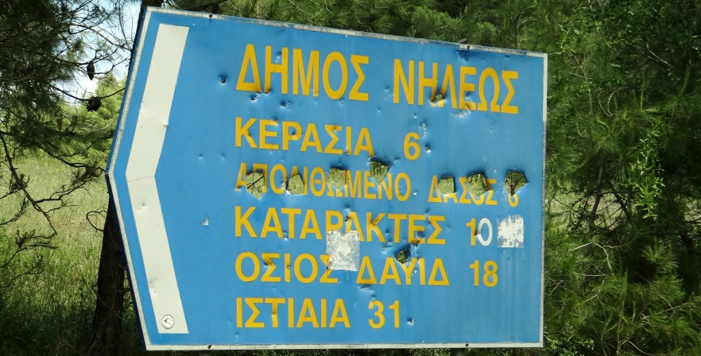 When we did find a road sign, it was a bit shot up or stickered or graffitied - must be a plan to stop tourists getting to the good places!