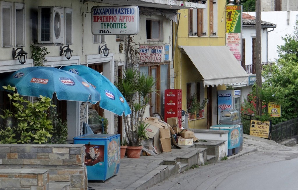 Main street in Zagora - luckily I can spot a cheese pie sign from a distance (the green lettering on the top sign!)