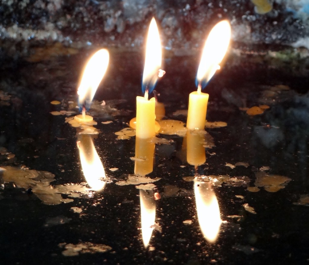 Candles burning in the little church/shrine.