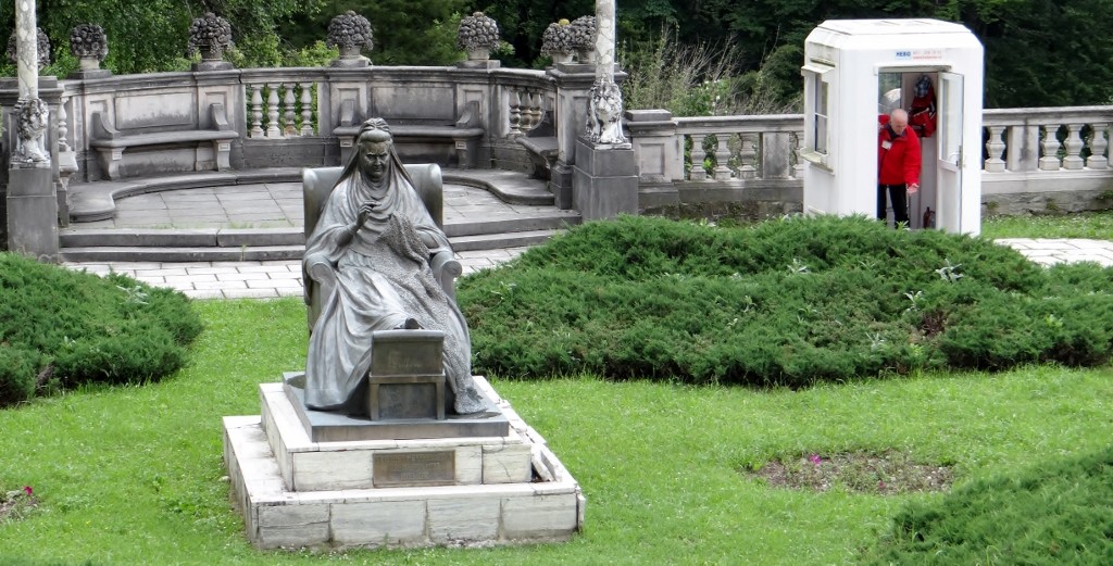 Queen Elizabeth looks almost as peed off as the fun police chap who had to come out of his hut to shout at someone