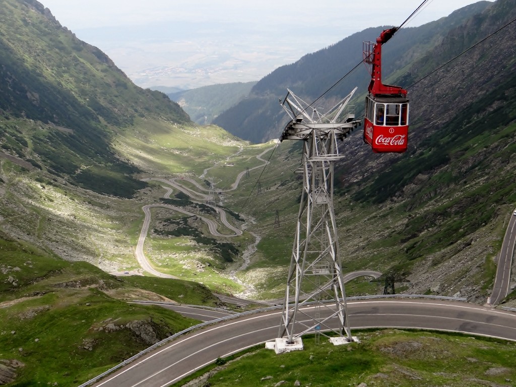 Don't fancy driving the pass - then grab the gondola instead! It looks like it is skimming the tops of the cars in places.