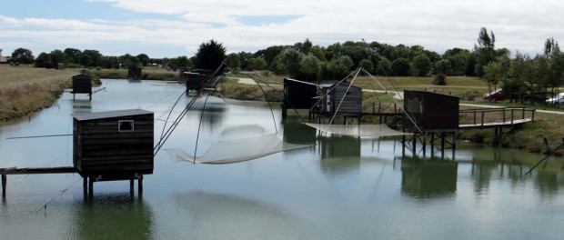 Lazy fishing; dip net, raise net, gather fish, it's a wonder there are any fish left in this inlet!