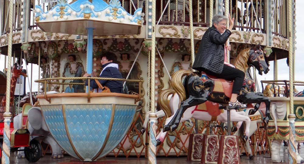 Some lovely Italian ladies having a blast on the carrousel