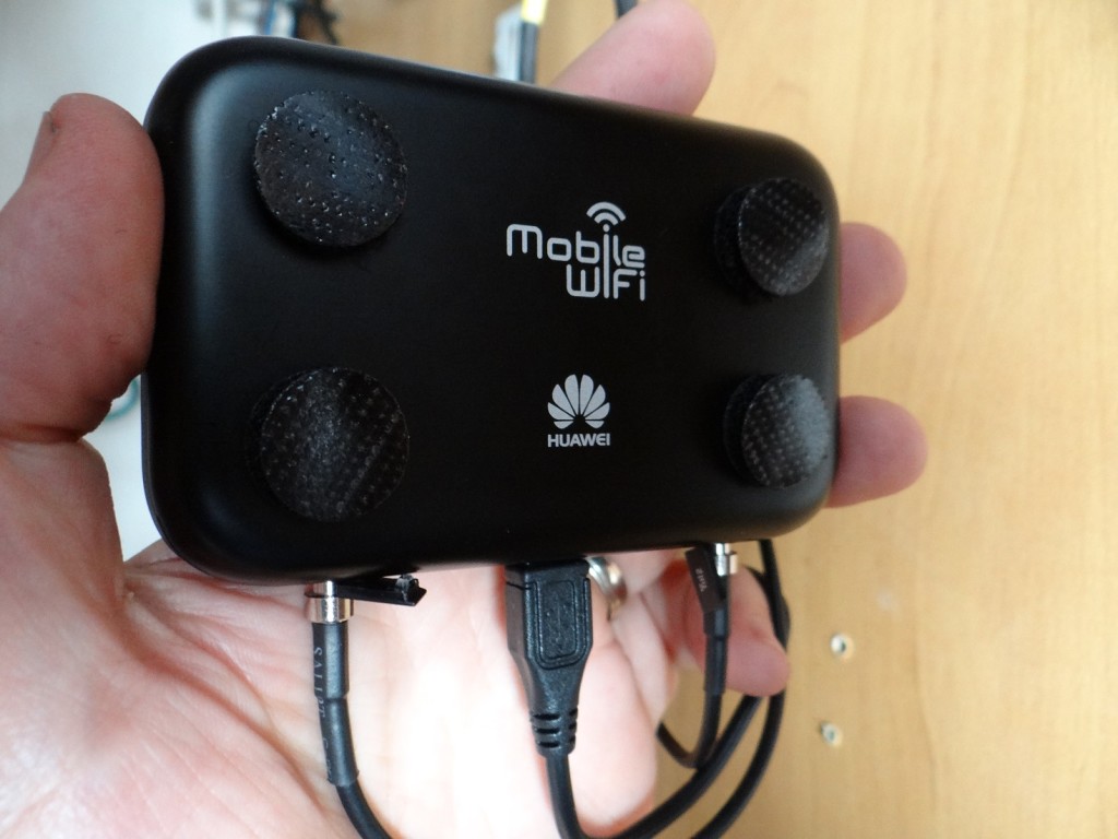 4G MiFi velcroed to wardrobe wall in motorhome