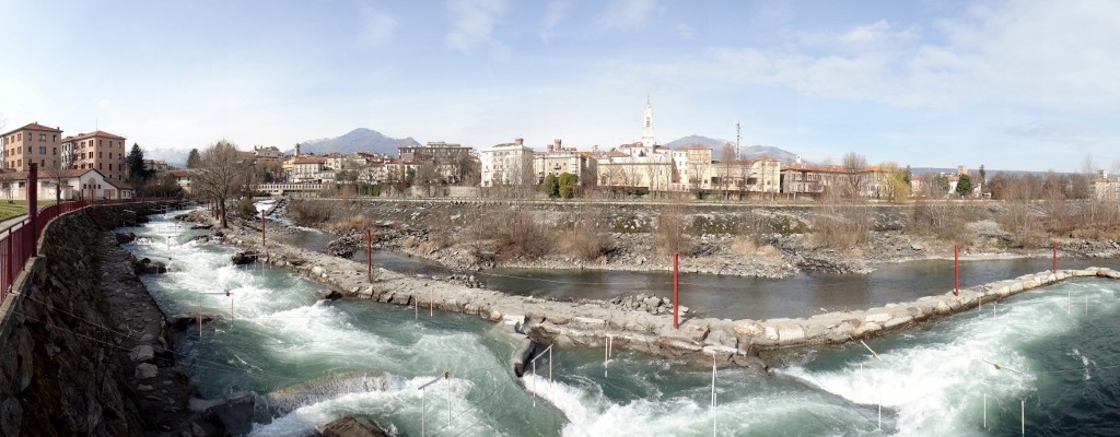 The river alongside the sosta's been 'tamed/angrified' for canoeists