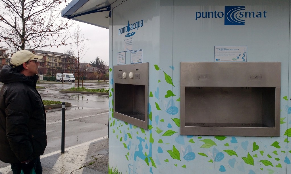 Jay eyeing up the water machine - free for still, 5c for 1.5l of fizzy - Zagan in his car park behind