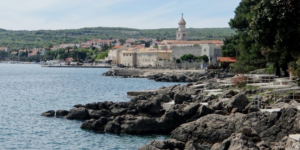 The City of Krk and man-made beaches on the rocks