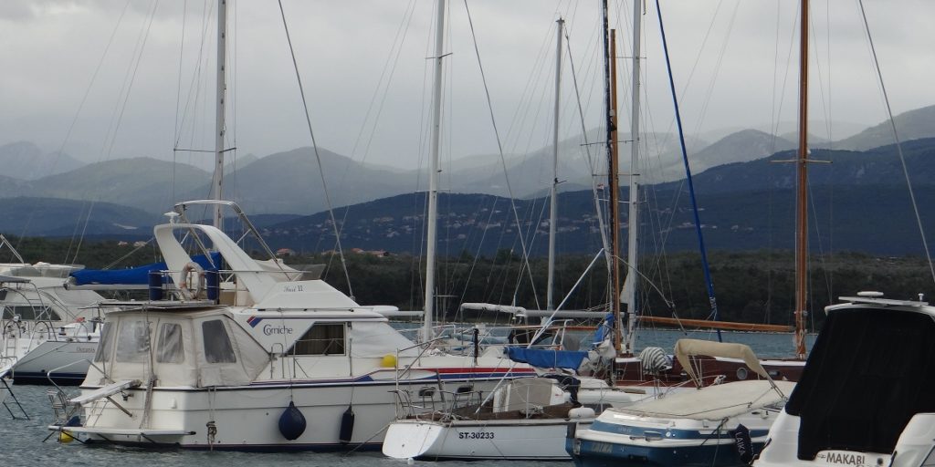 Marina at Klimno, mountains in the background beckon us towards Slovenia