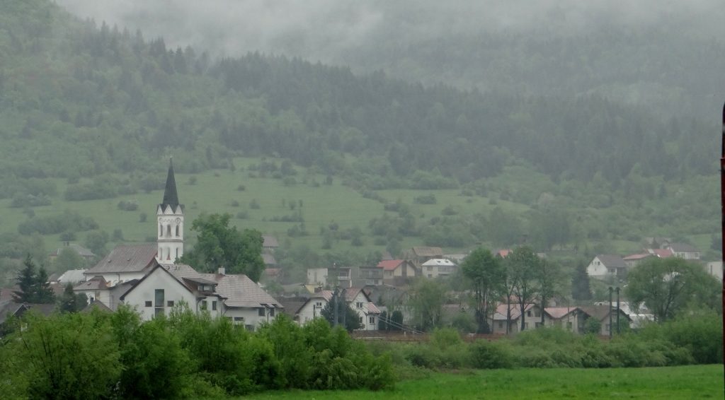 Slovak village spied from the road. We discussed how we should go see some of the places with no stars or underlines on the map - the non-tourist places - just to see what they're like close up