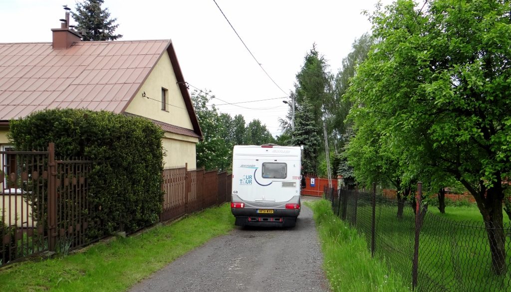 Motorhome on narrow lane