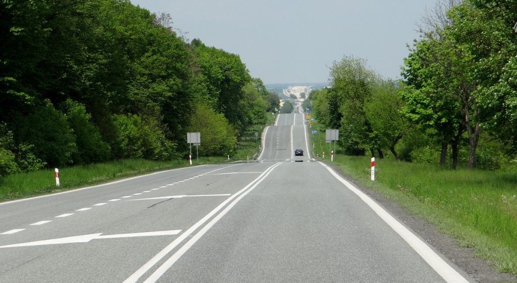 Yeah baby! Fantastic Polish roads! But hold on a minute, what's that in the distance?
