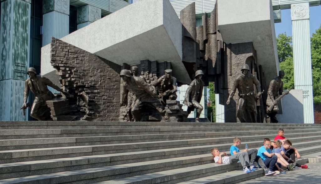 Bored boys at the Warsaw uprising memorial