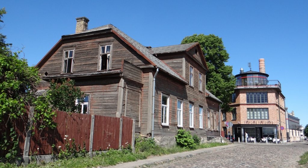 Old wooden buildings in Riga. Most of them were renovated, this one has a view out over the river to the city, so can't have a long wait to be tarted up
