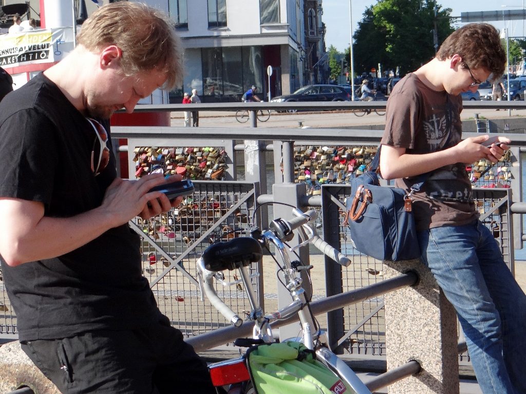 The Finns love their phones, but at least these two weren't sitting together as if in conversation but on phones - many others were