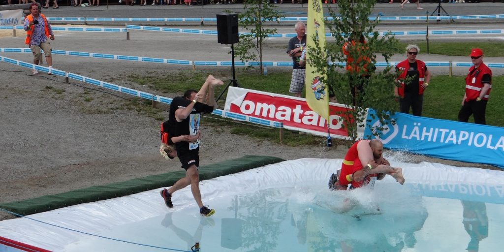The best technique: carrying your wife (no longer actually has to be your wife!) upside down. Leap into the water obstacle at full pelt. Go slow and go left on the exit. Try not to drown your wife.