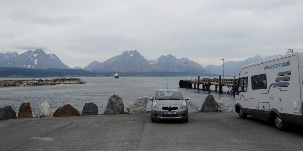 Motorhome free camping at the port at Breivikeidet, Norway