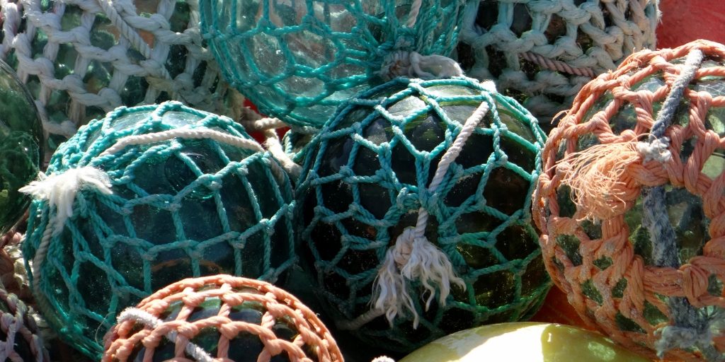 Industrial fishing gear lines the port