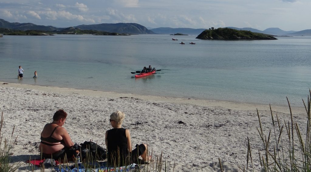 Locals on one of the white sand natural beaches, this one 100 meters from us